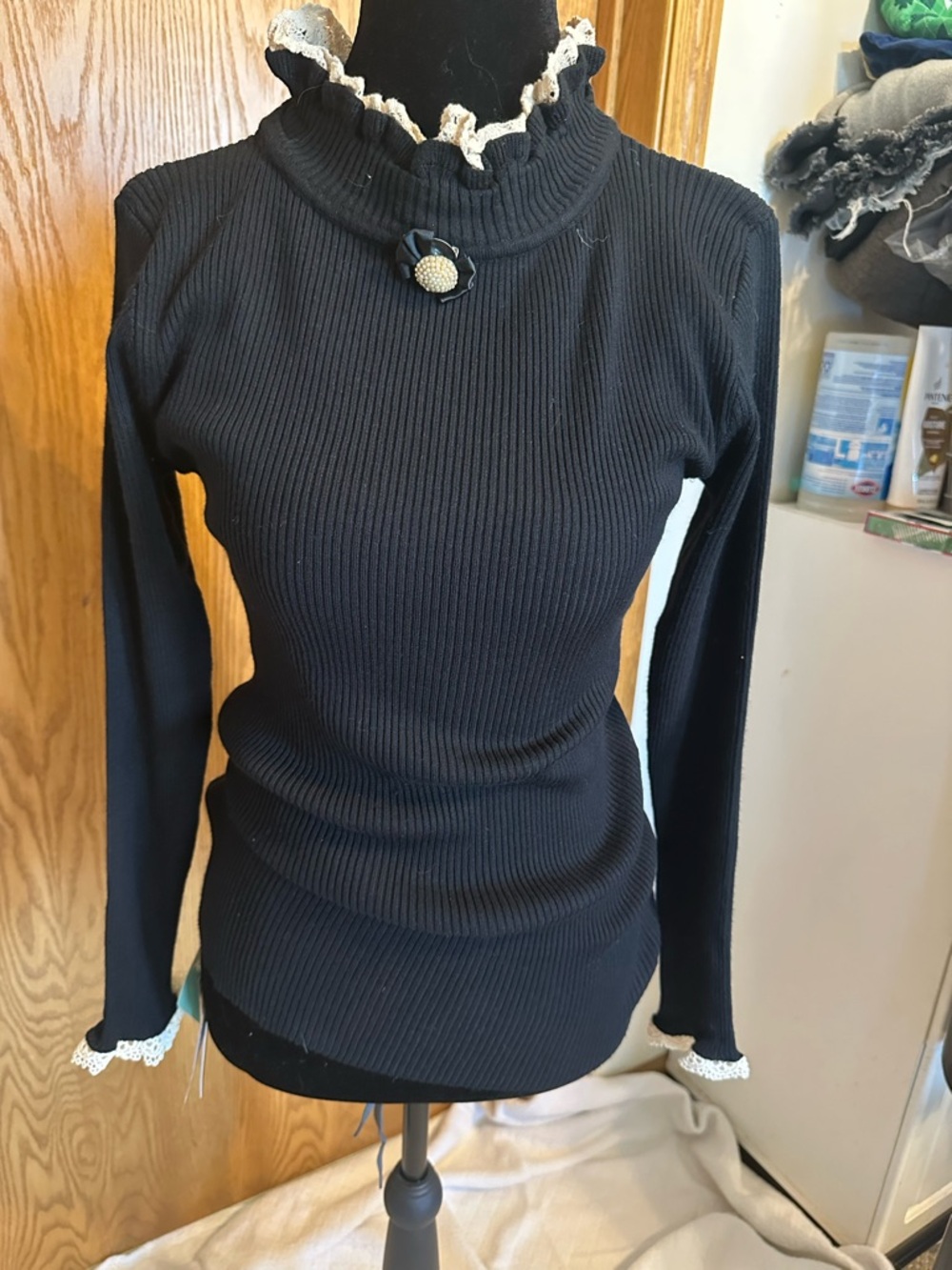 Classic Black Ribbed Mock Neck Sweater with Lace Trim